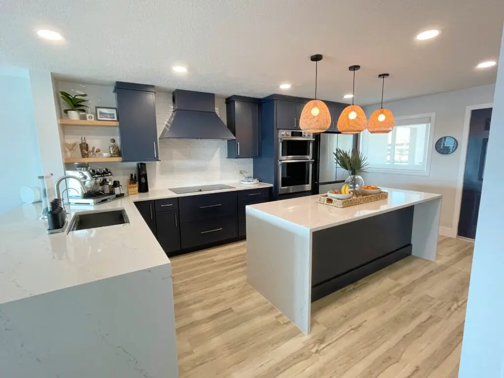 A,Decorated,Modern,Coastal,Kitchen,With,Blue,Cabinets,,White,Countertops,
