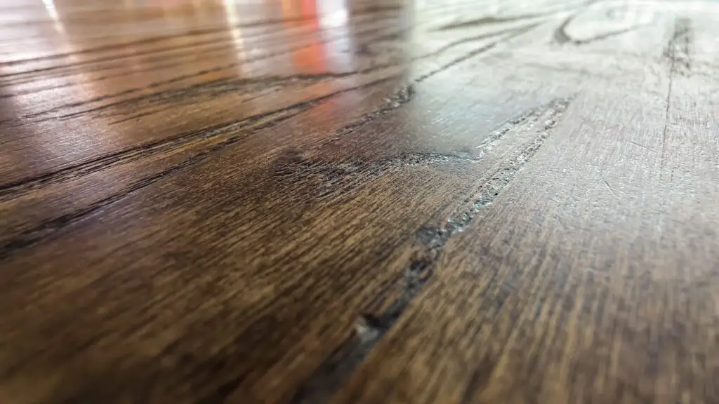 Close-up,Of,A,Dark,,Stained,Wood,Surface,With,Visible,Grain